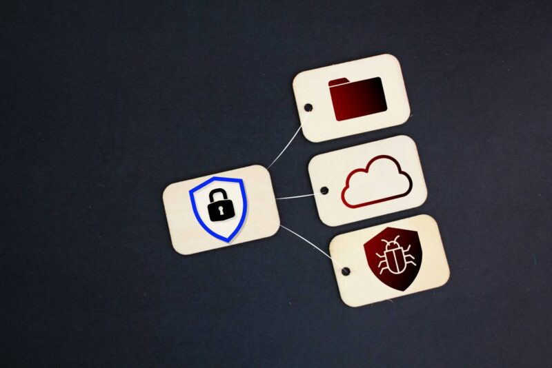 Tag wood with icons of security, antivirus, cloud and folder pertaining to security management